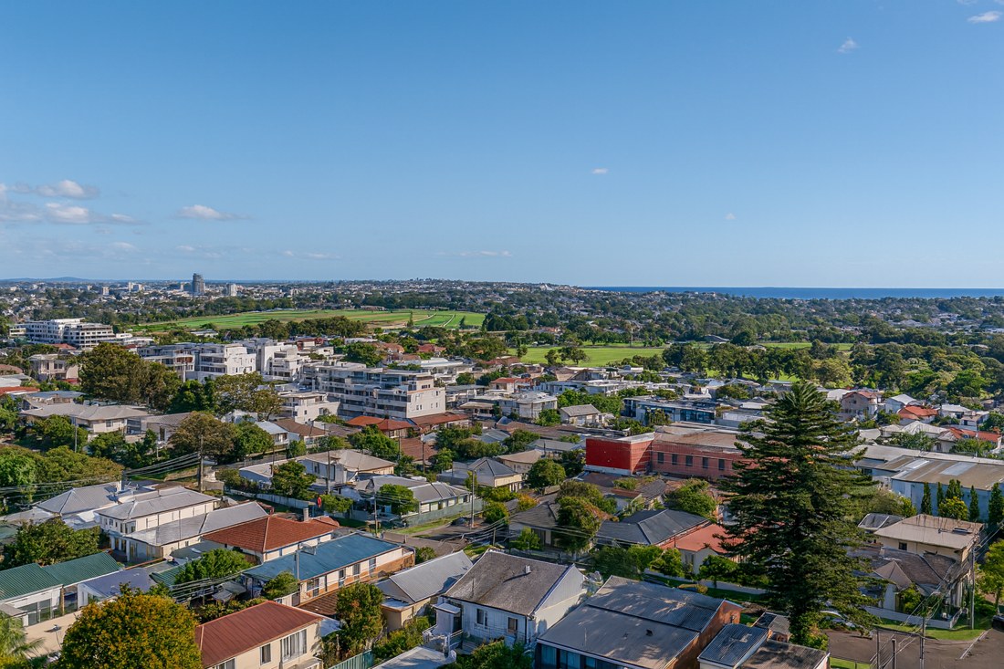 Adamstown, NSW, Residential rooftops with distant coastal view