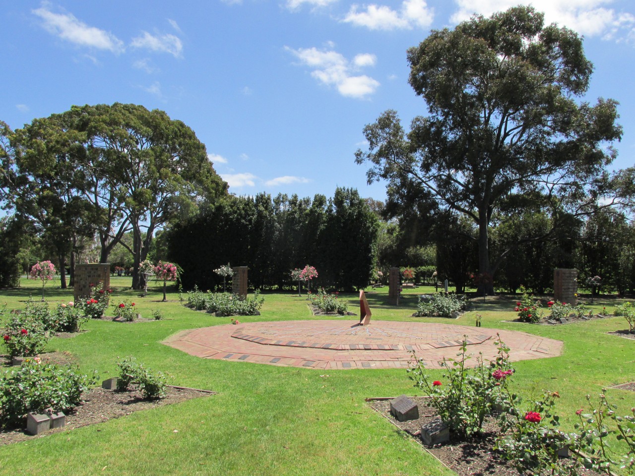 Altona North, VIC, Rose garden with sundial in park setting