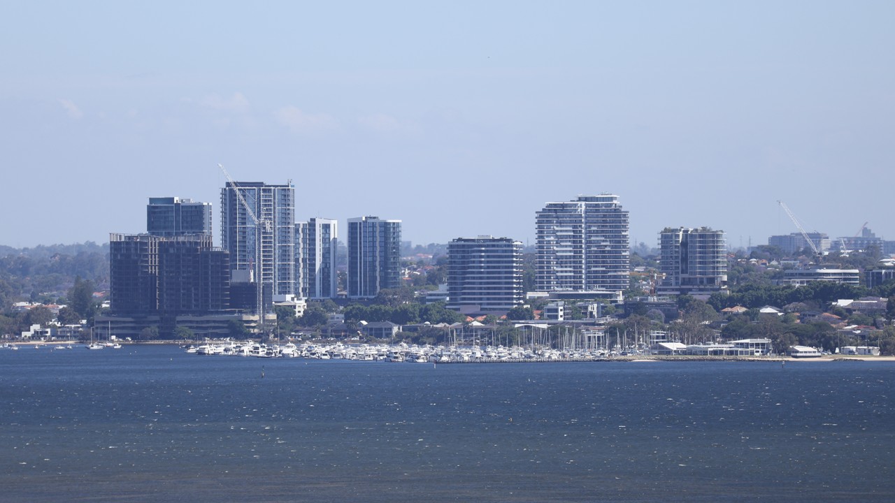 Applecross, WA, Swan River with city skyline in background