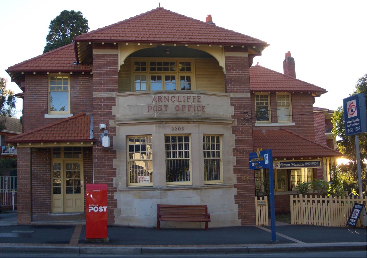Arncliffe, NSW, Historic post office building with red mailbox