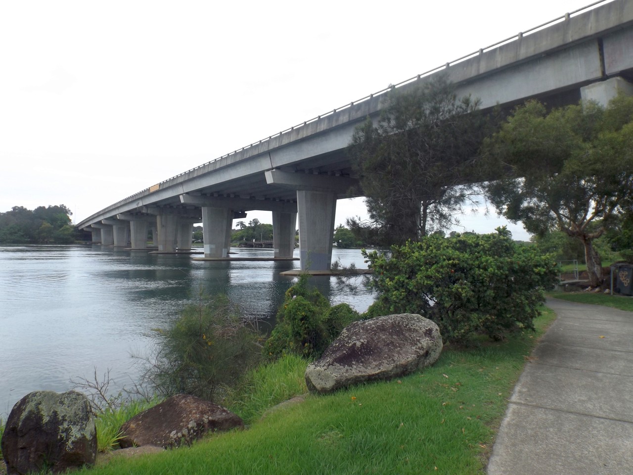 Banora Point, NSW, Concrete bridge over a calm river