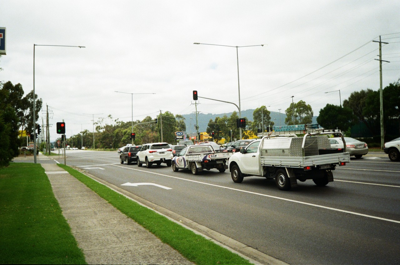 Bayswater North, VIC, Intersection with cars and traffic lights on road