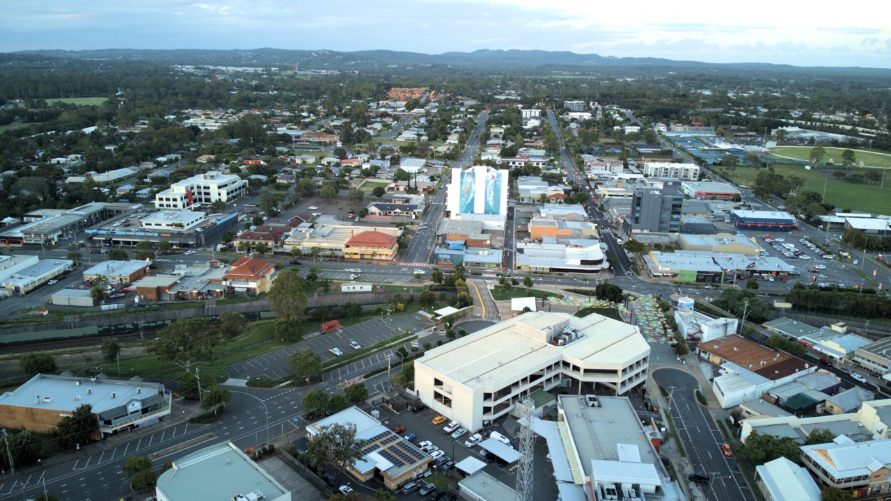 Beenleigh, QLD, Aerial view of urban area with buildings and roads