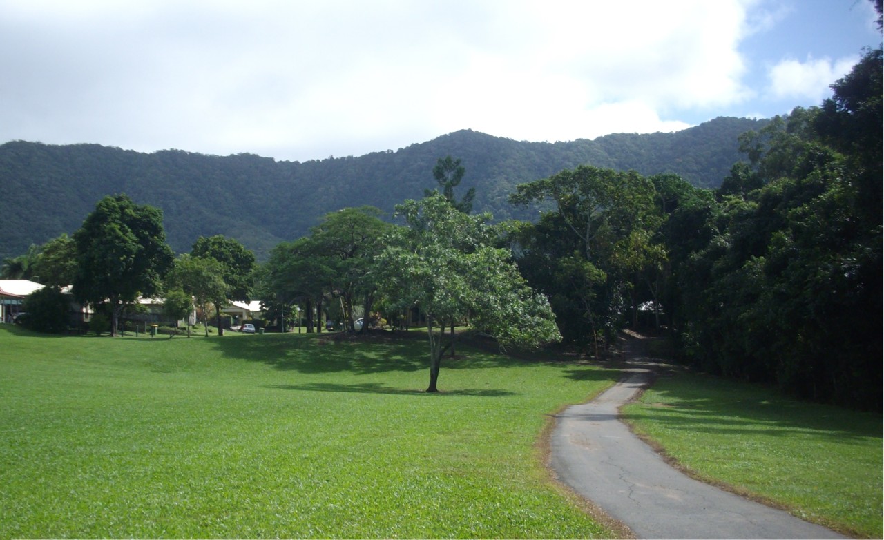 Bentley Park, QLD, Walking path through parkland with mountain backdrop