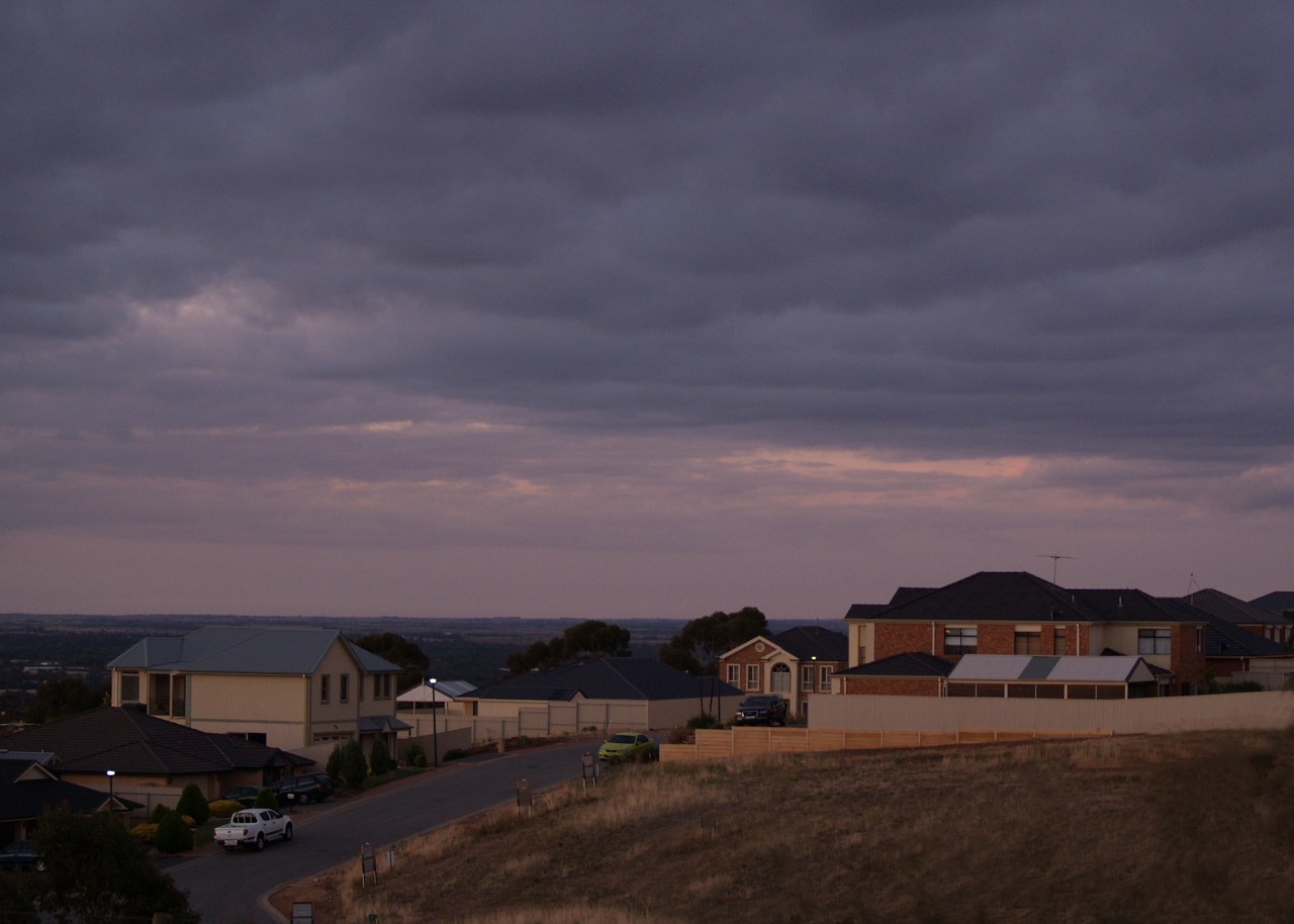 Blakeview, SA, Residential houses under a cloudy evening sky