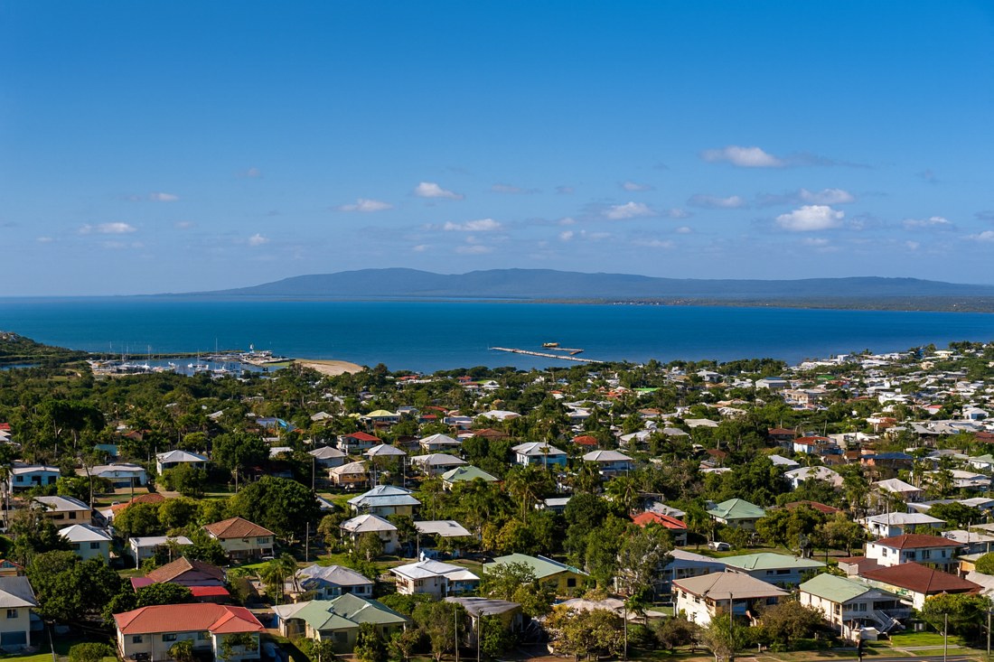 Bowen, QLD, Aerial view of houses with ocean backdrop