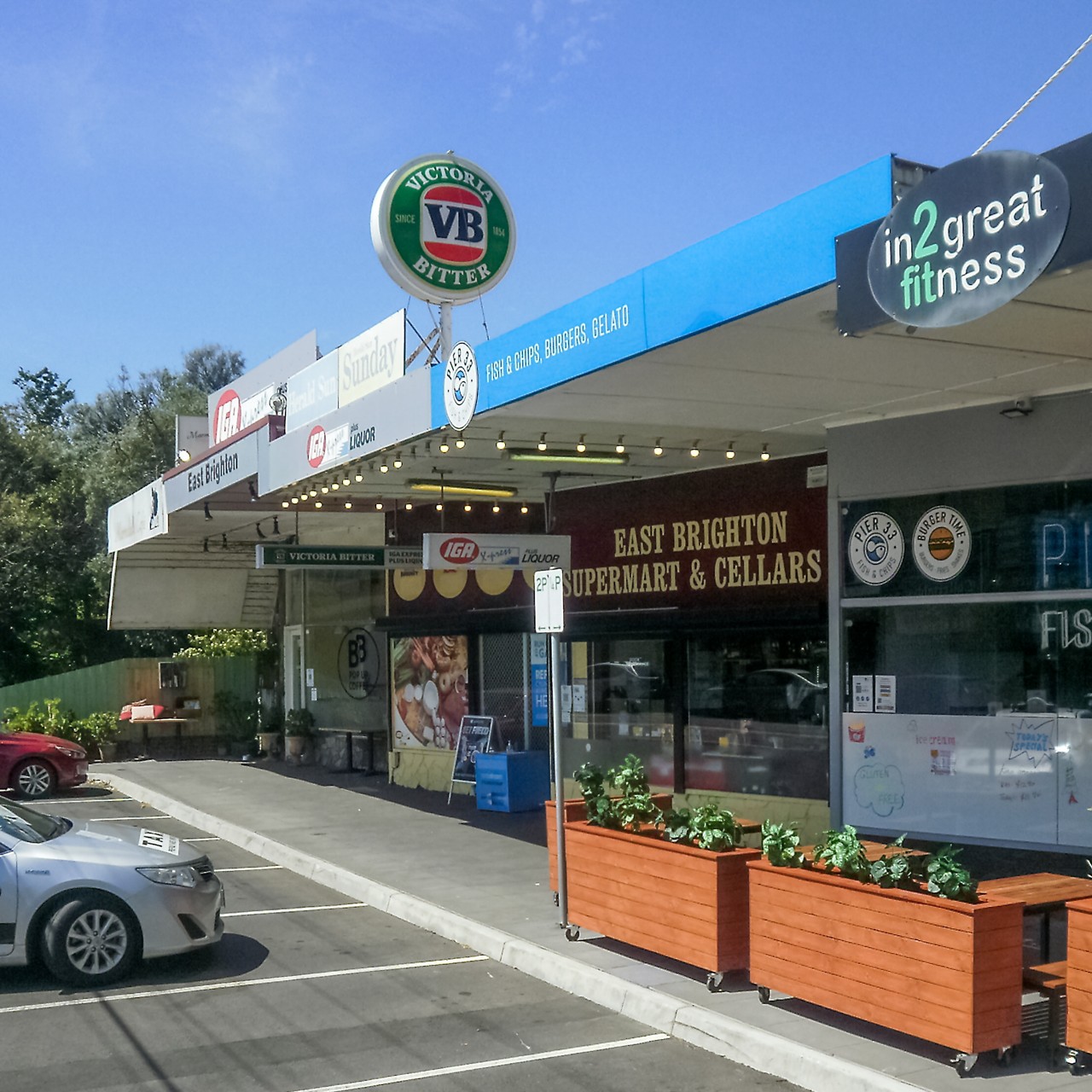 Brighton East, VIC, Supermarket and shops with parking area