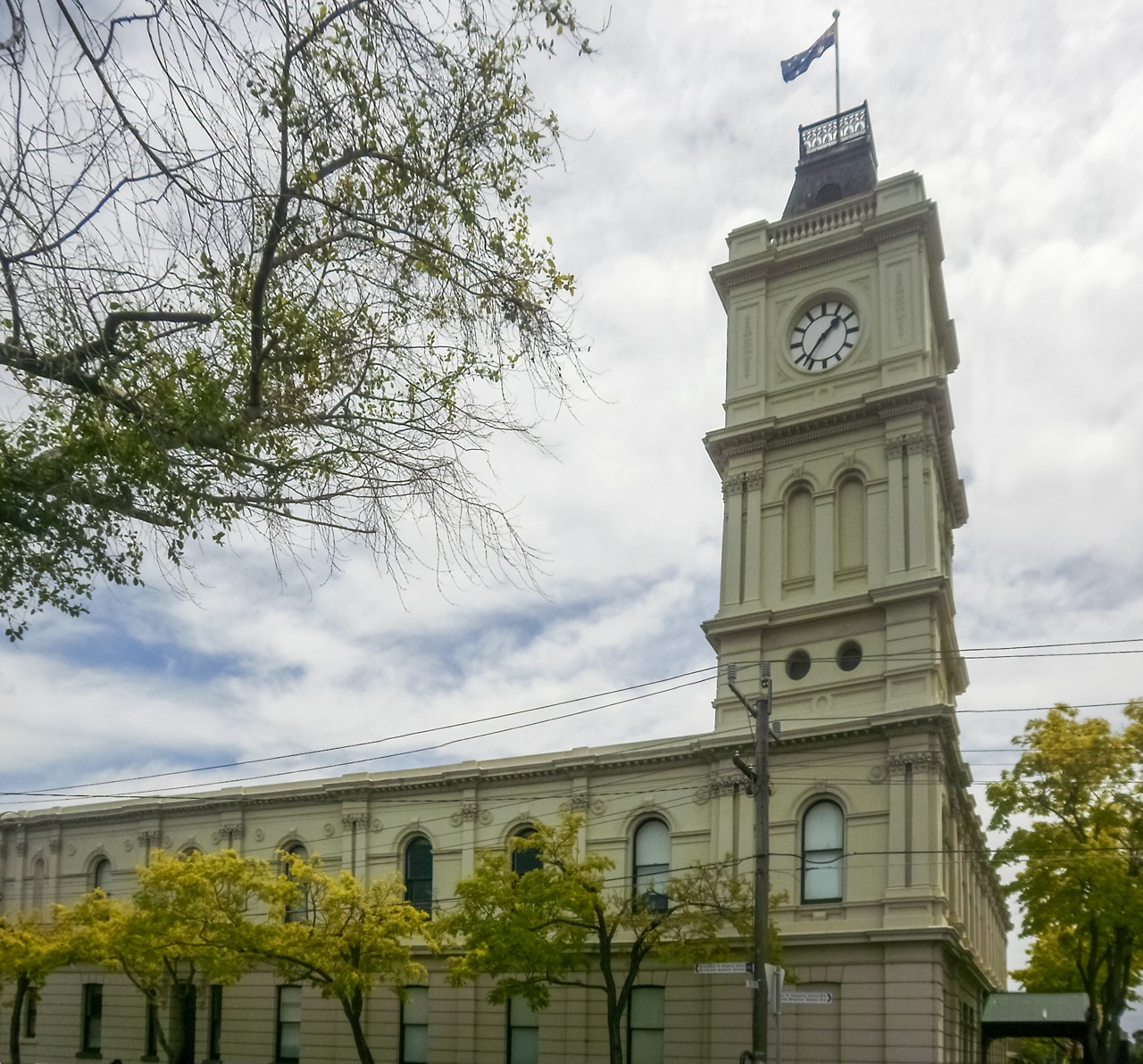 Brighton, VIC — Historic clock tower on a tree-lined street