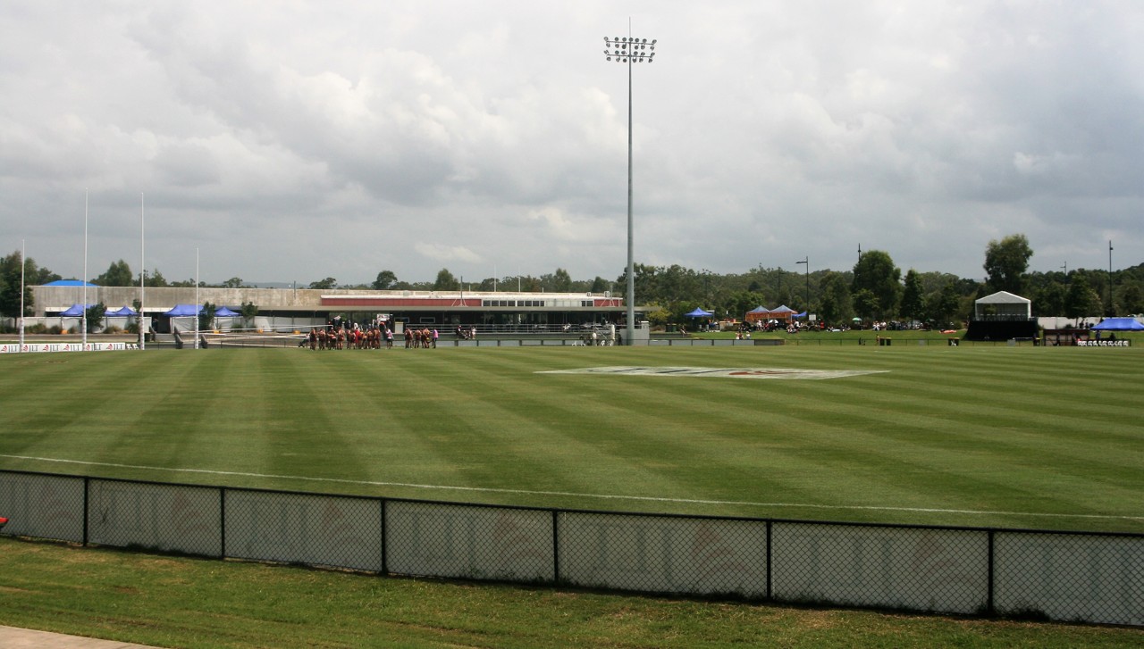 Burpengary, QLD, Rugby field with grandstand and light poles