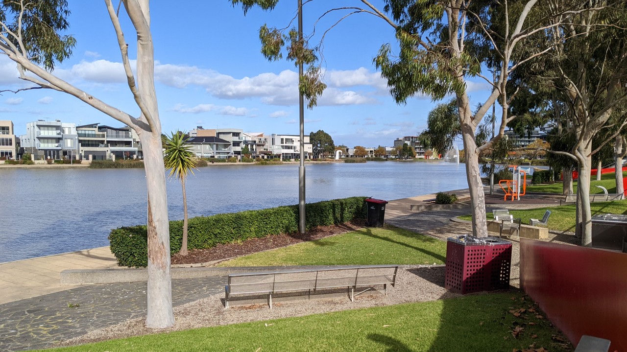 Caroline Springs, VIC, Lake and parkland with modern houses nearby