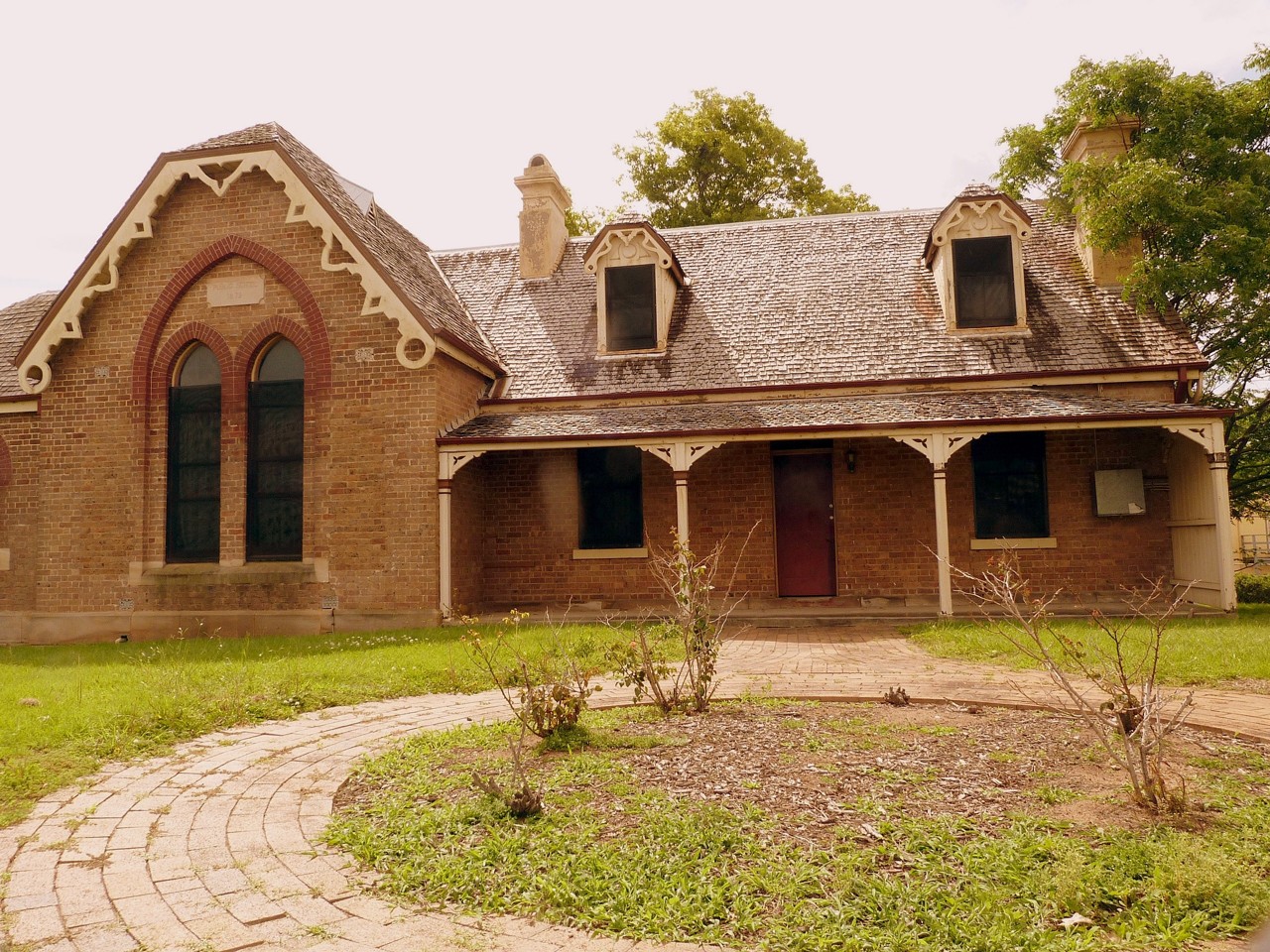 Castle Hill, NSW, Historic sandstone building near green gardens