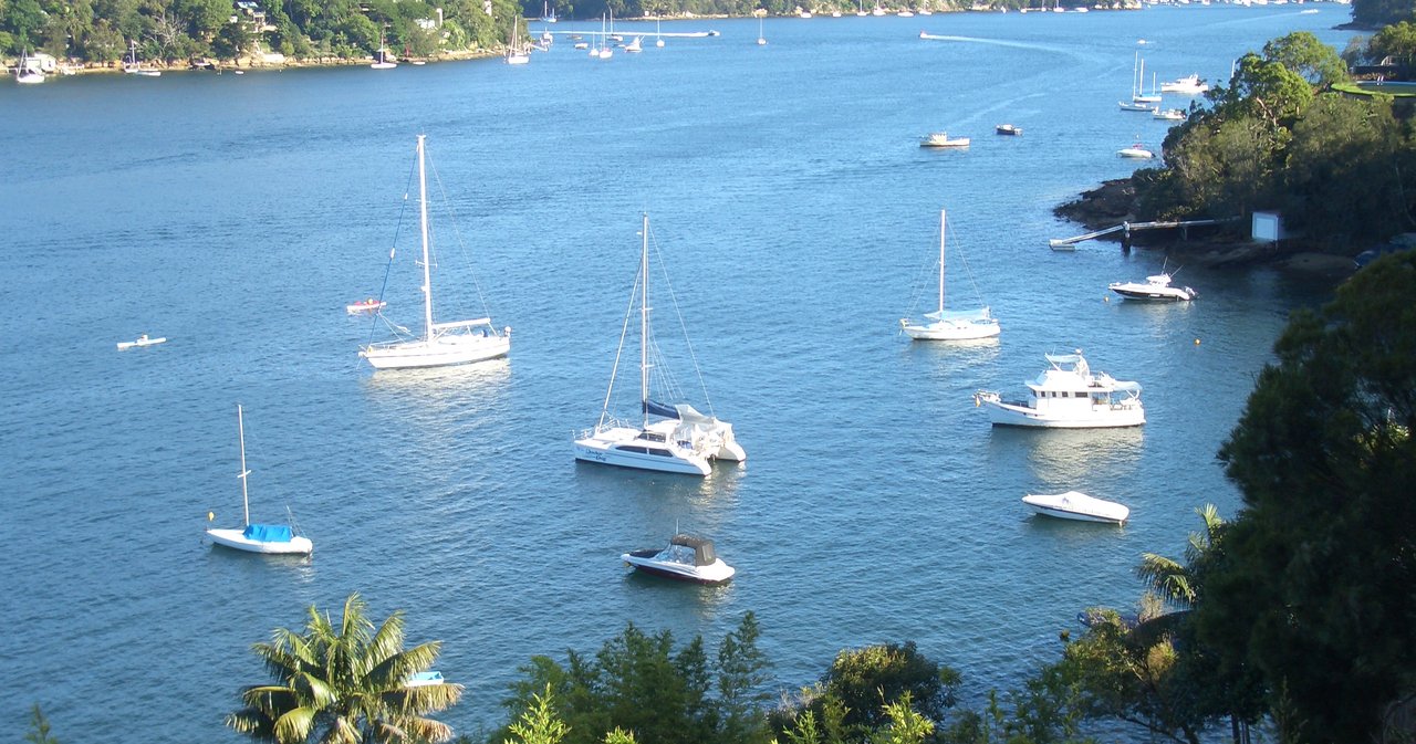 Castlecrag, NSW — Yachts moored on Middle Harbour with bushland foreshore
