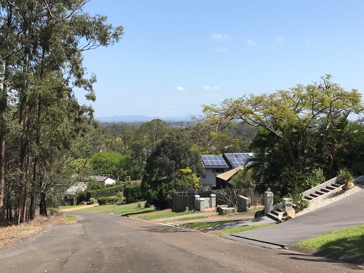 Chapel Hill, QLD, Residential street with houses and trees