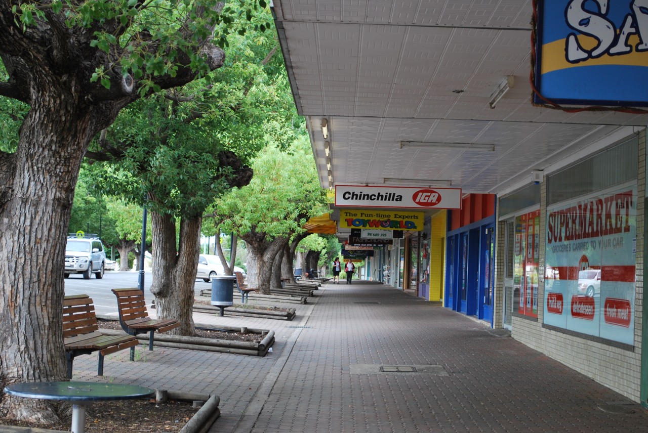 Chinchilla, QLD, Shaded shopping street with benches and trees