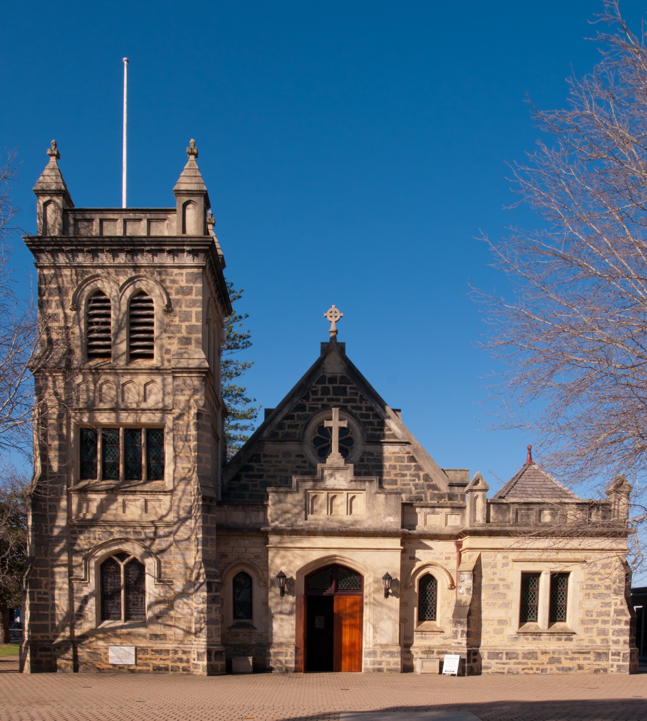 Claremont, WA, Stone church with towers on a sunny day