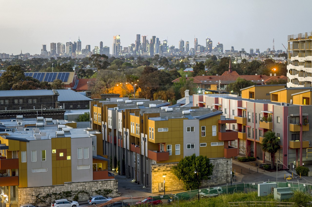 Coburg, VIC, Modern apartments with city skyline in distance