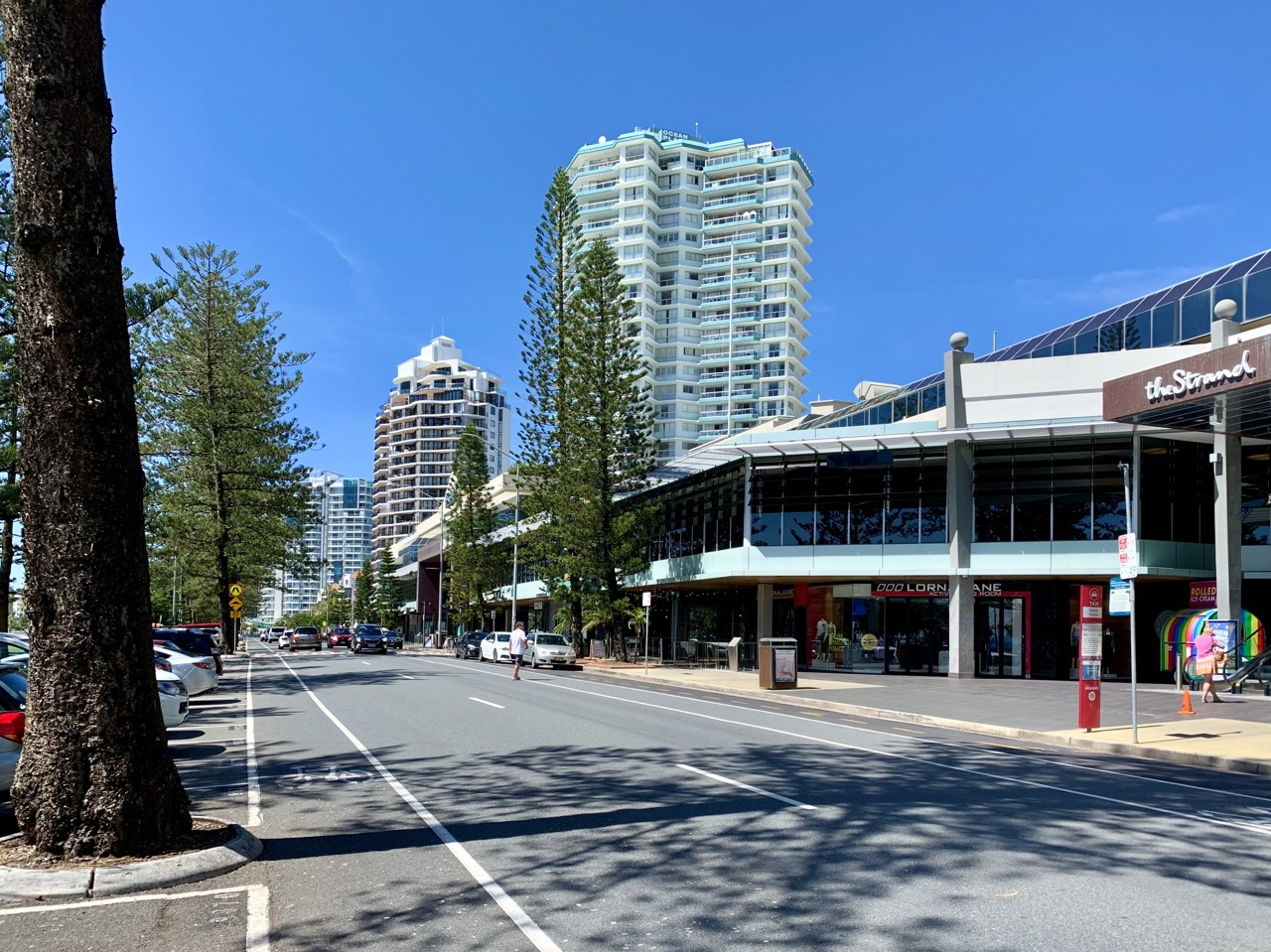 Coolangatta, QLD, Street with shops and high-rise buildings