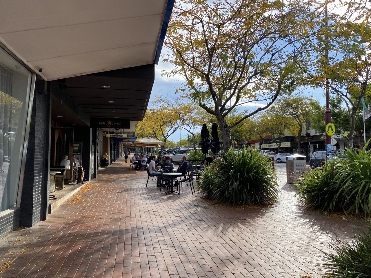 Croydon, VIC, Cafes and shops along a tree-lined street