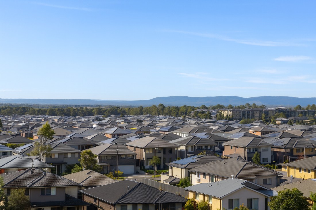 Denham Court, NSW, Suburban houses with distant hills in background