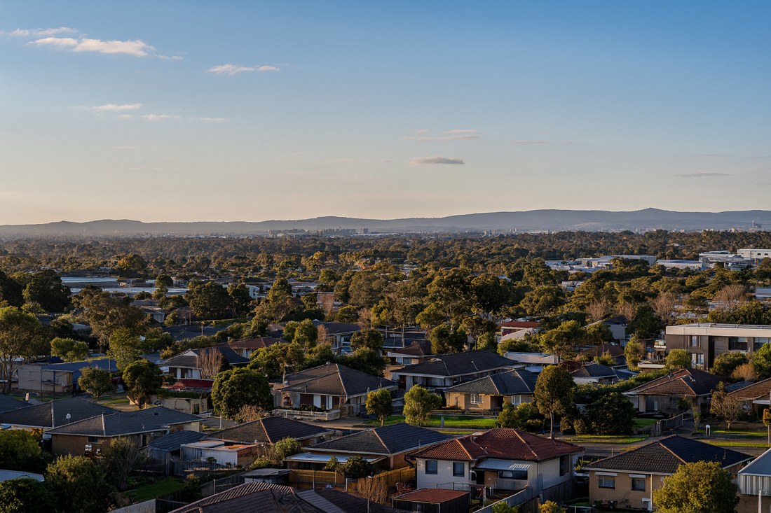Doveton, VIC, Suburban houses with distant hills in background