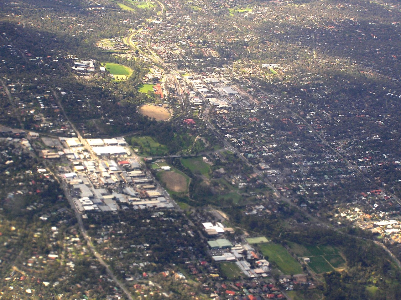 Eltham, VIC, Aerial view of suburban landscape with greenery