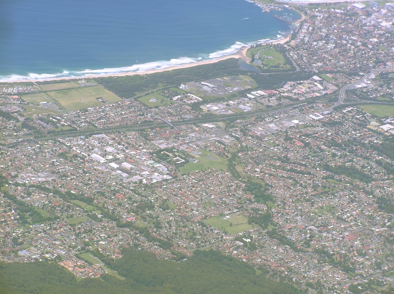 Fairy Meadow, NSW, Aerial view of coastline and residential area