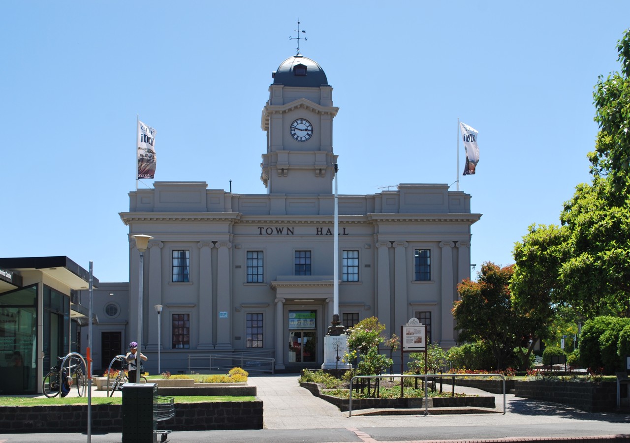 Geelong West, VIC, Town hall building with clocktower and flags