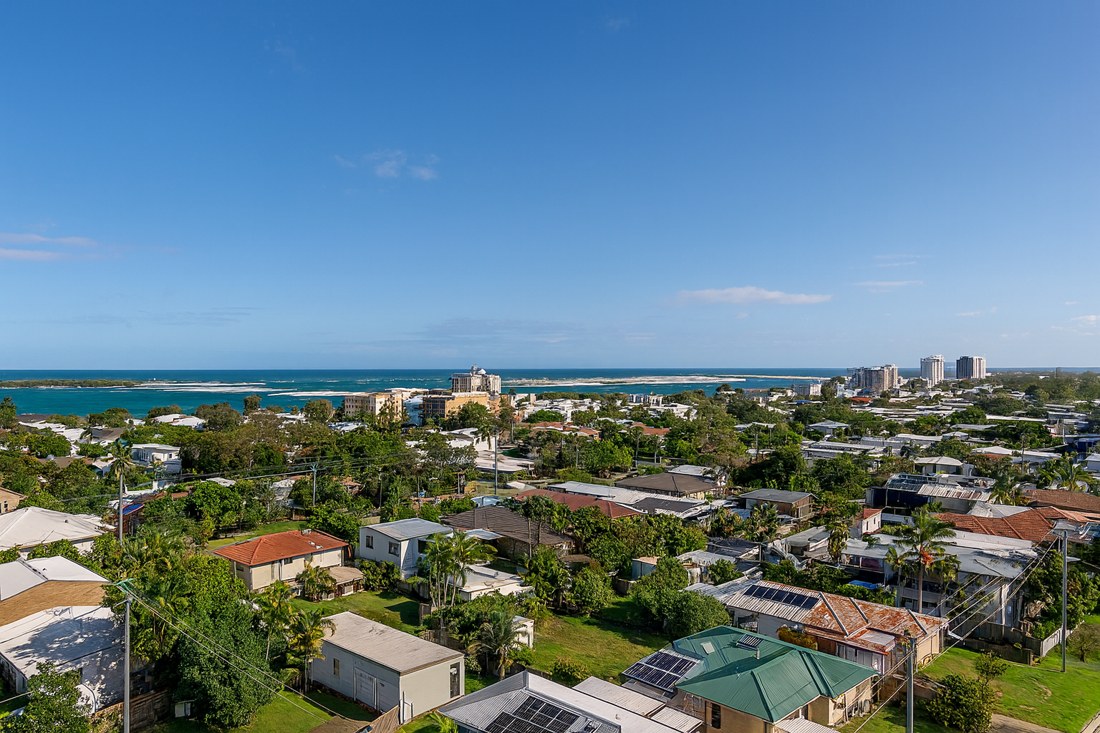 Golden Beach, QLD, Aerial view of houses near the coastline