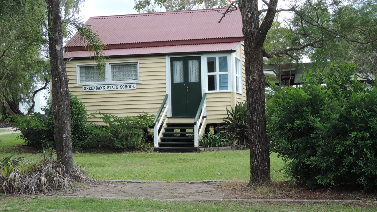 Greenbank, QLD, Heritage building with a red roof and steps