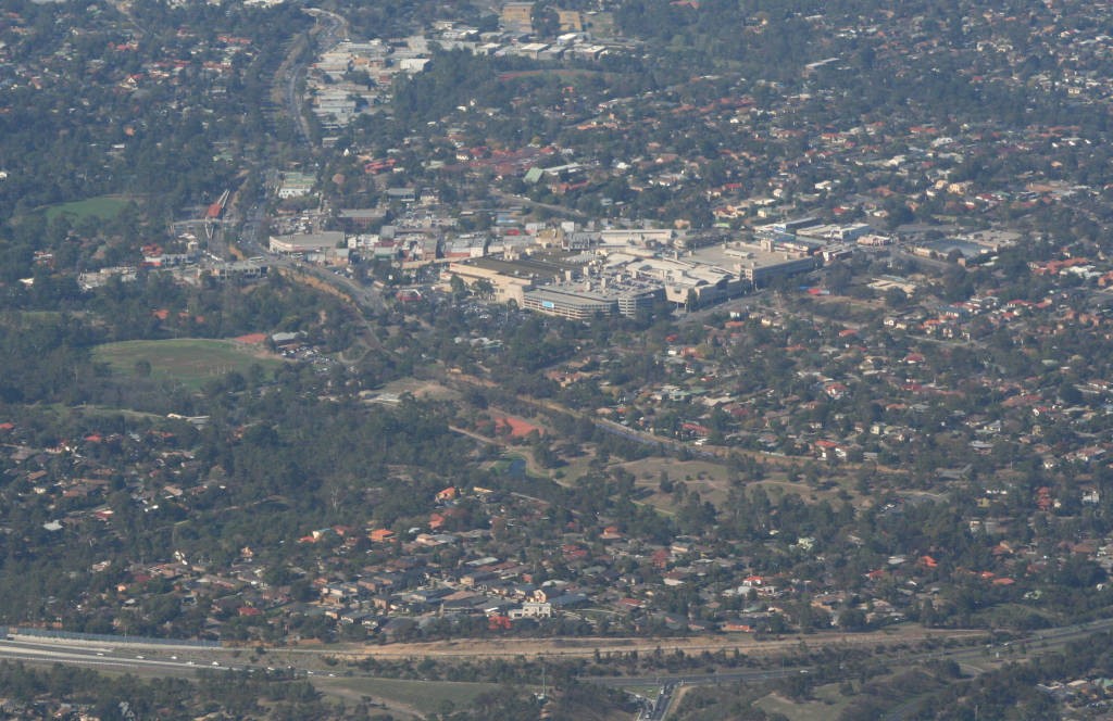 Greensborough, VIC, Aerial view of roofs and shopping centre