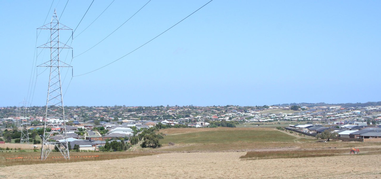 Grovedale, VIC, Residential area with power lines and fields
