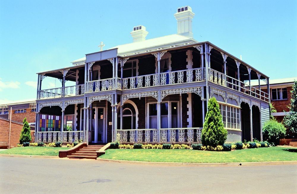 Harristown, QLD, Historic building with intricate ironwork balconies