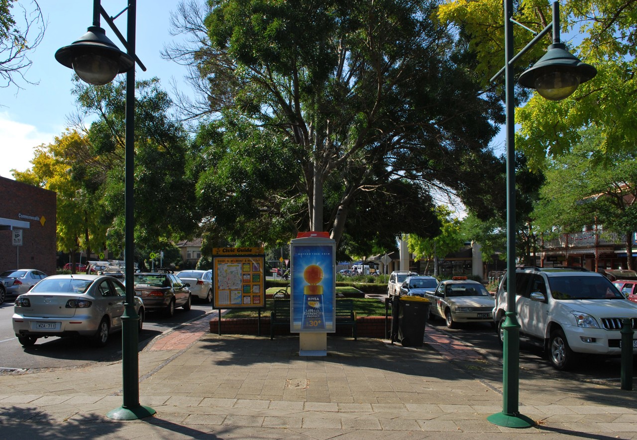Highton, VIC, Cars parked near a community noticeboard