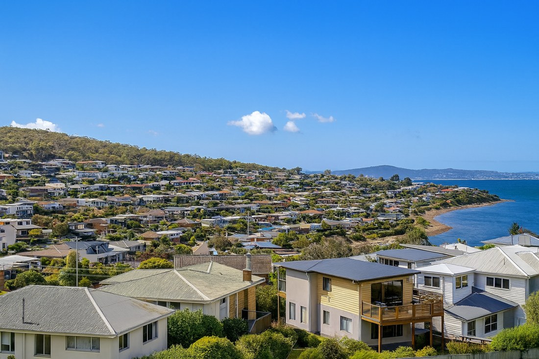 Howrah, TAS, Residential area overlooking a bay and hills