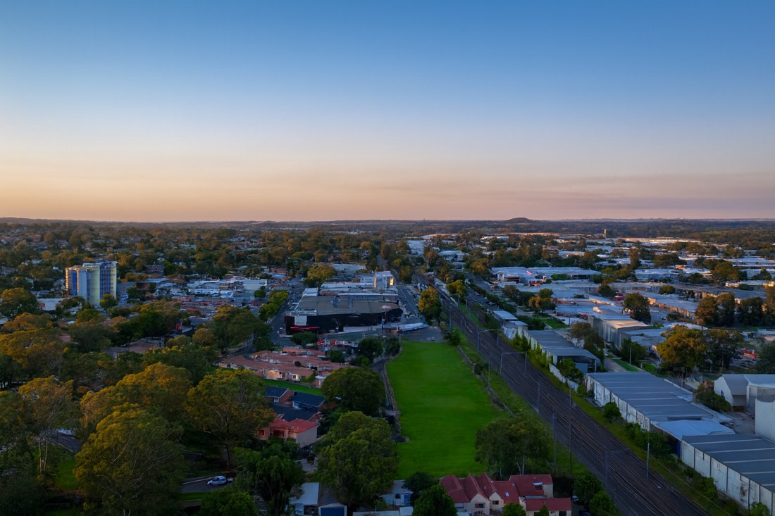 Ingleburn, NSW, Aerial view over residential and industrial areas