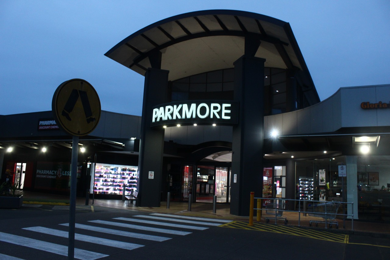 Keysborough, VIC, Entrance to Parkmore Shopping Centre at dusk