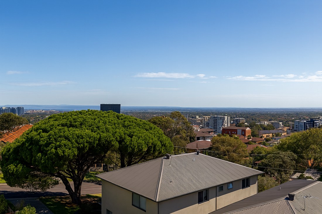 Kingsford, NSW, Residential buildings with city skyline view