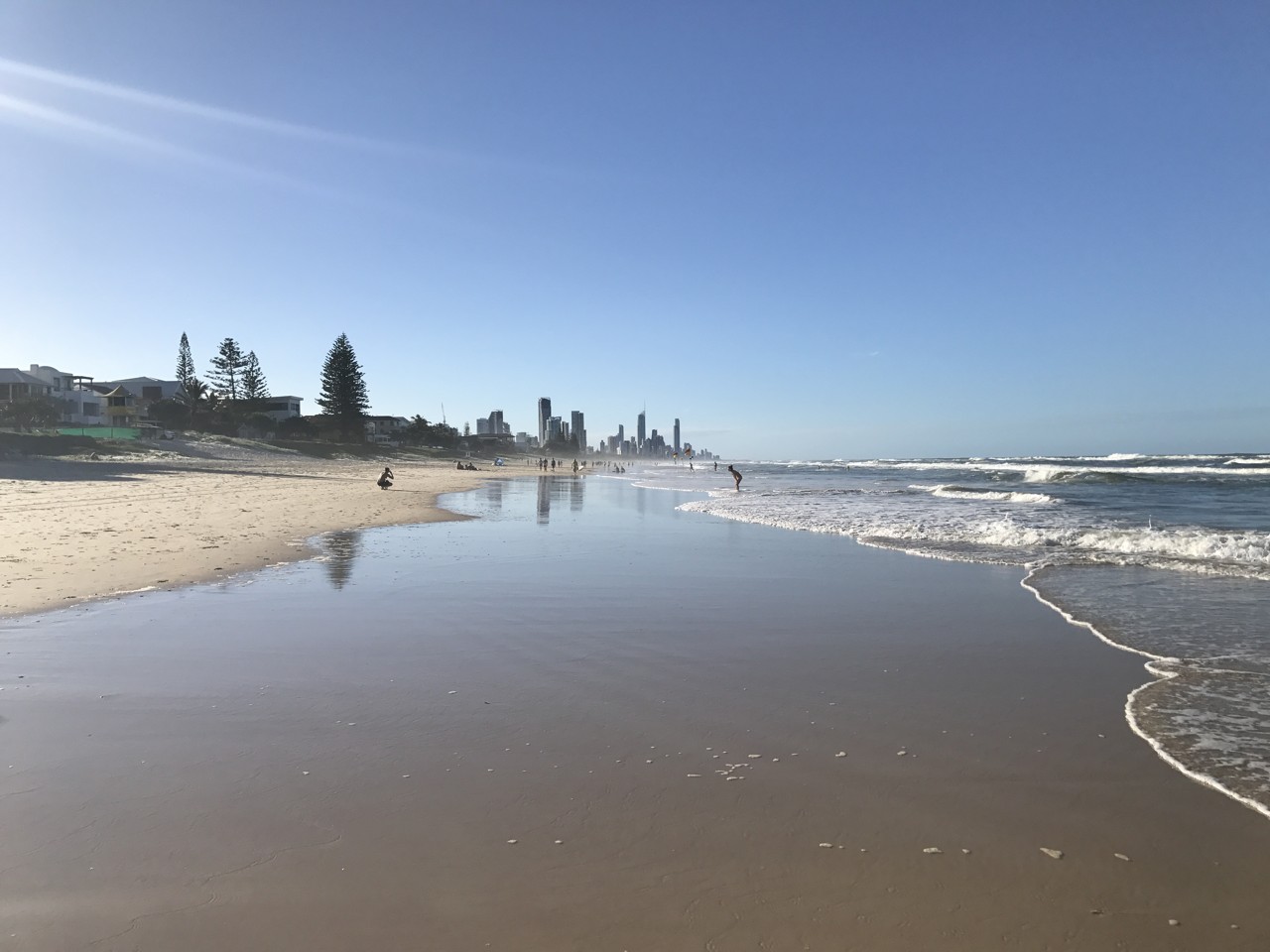 Mermaid Beach, QLD, Sandy beach with city skyline in background