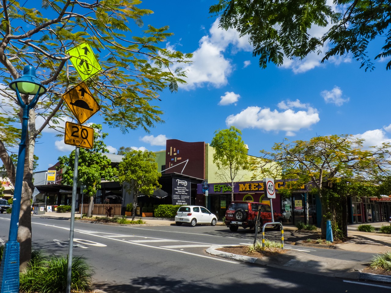 Mitchelton, QLD, Intersection with shops and traffic signs