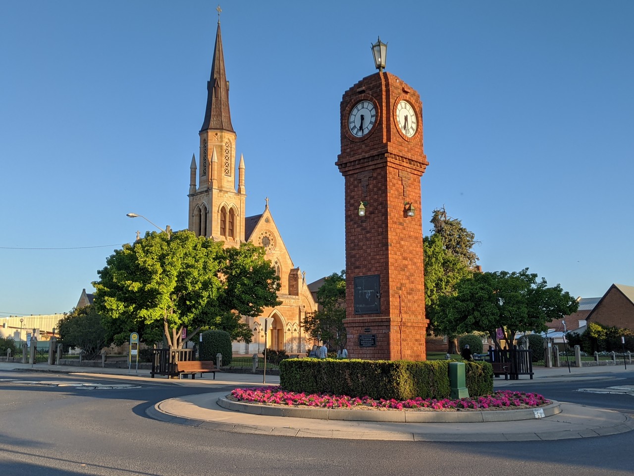 Mudgee, NSW, Brick clock tower and church on roundabout