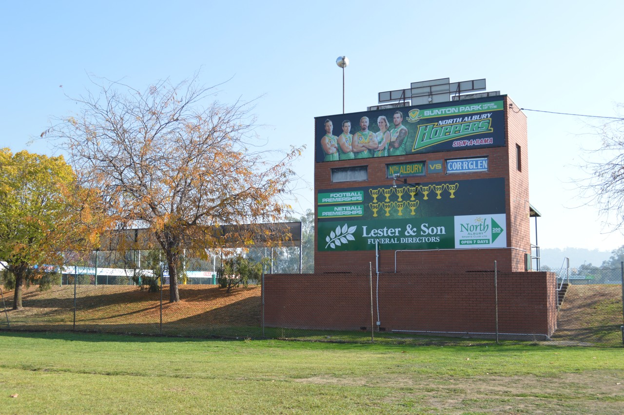 North Albury, NSW, Scoreboard at a sports ground with trees