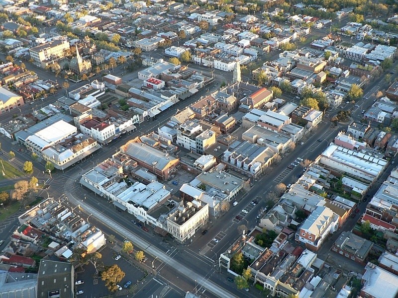 North Melbourne, VIC, Aerial view of residential and commercial buildings