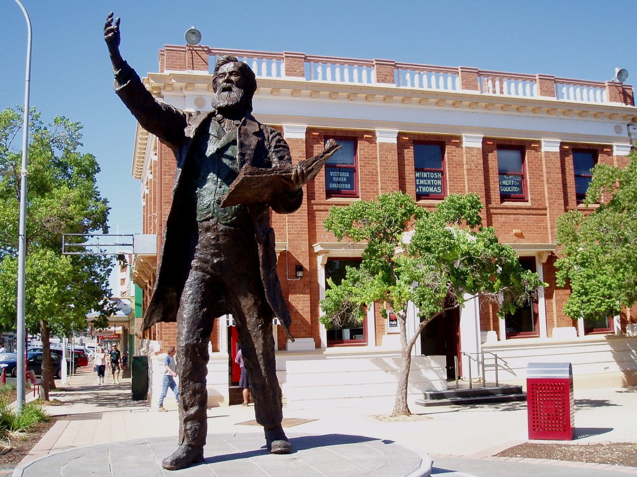 Parkes, NSW, Statue outside a heritage brick building