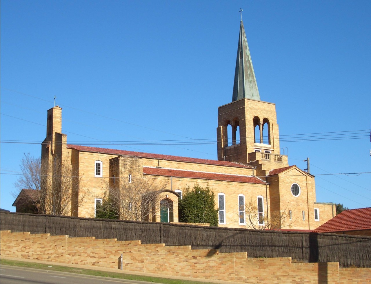 Penshurst, NSW, Brick church with tall spire and bell tower