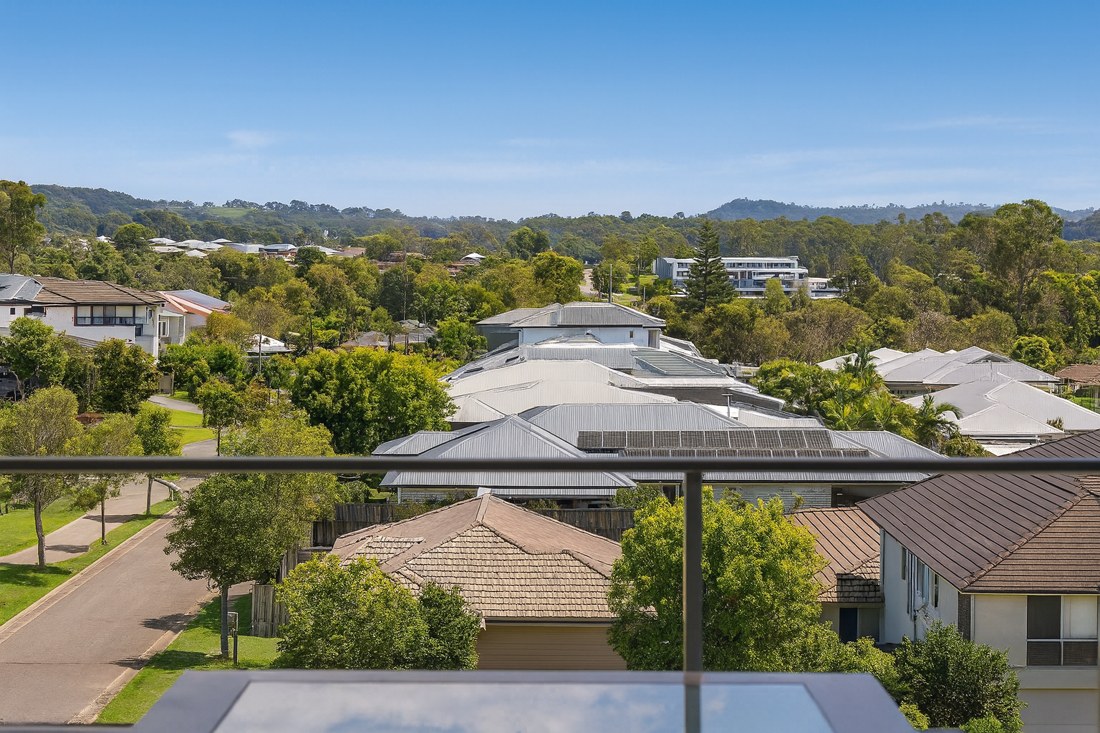 Pimpama, QLD, Suburban houses with solar panels from balcony view