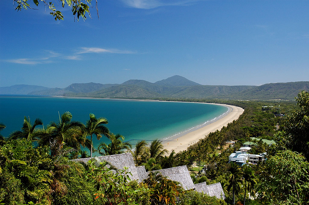Port Douglas, QLD, Palm-fringed Four Mile Beach with mountain backdrop