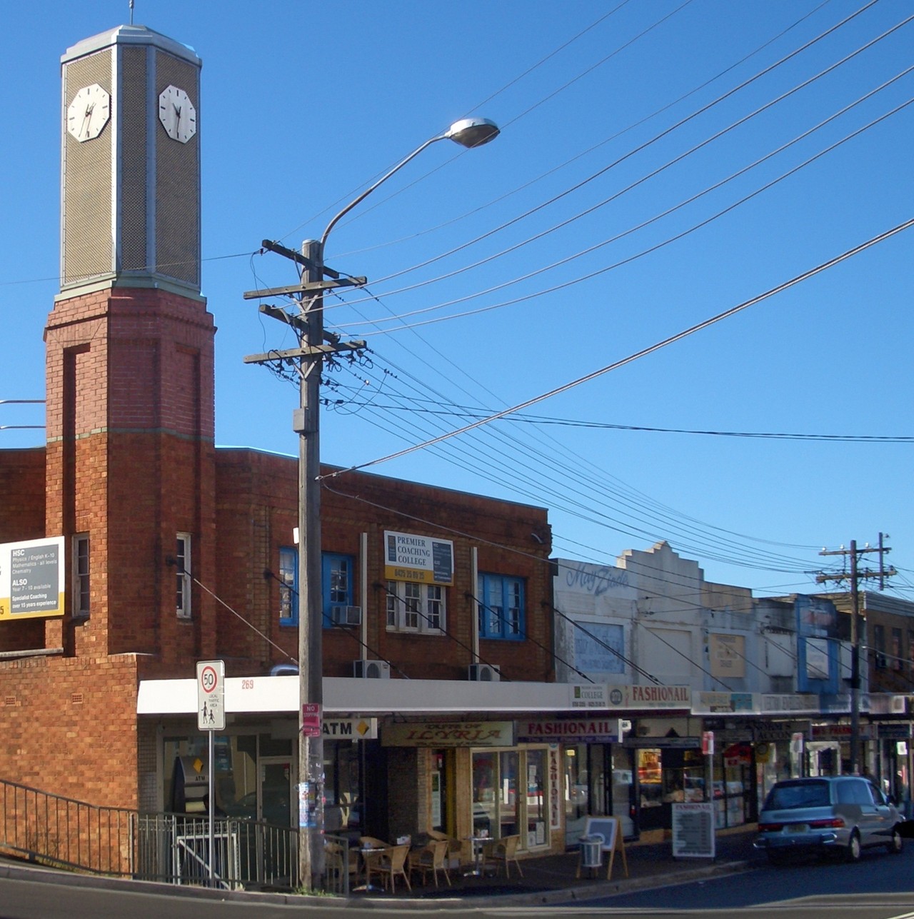 Punchbowl, NSW, Clocktower and shops along a suburban street