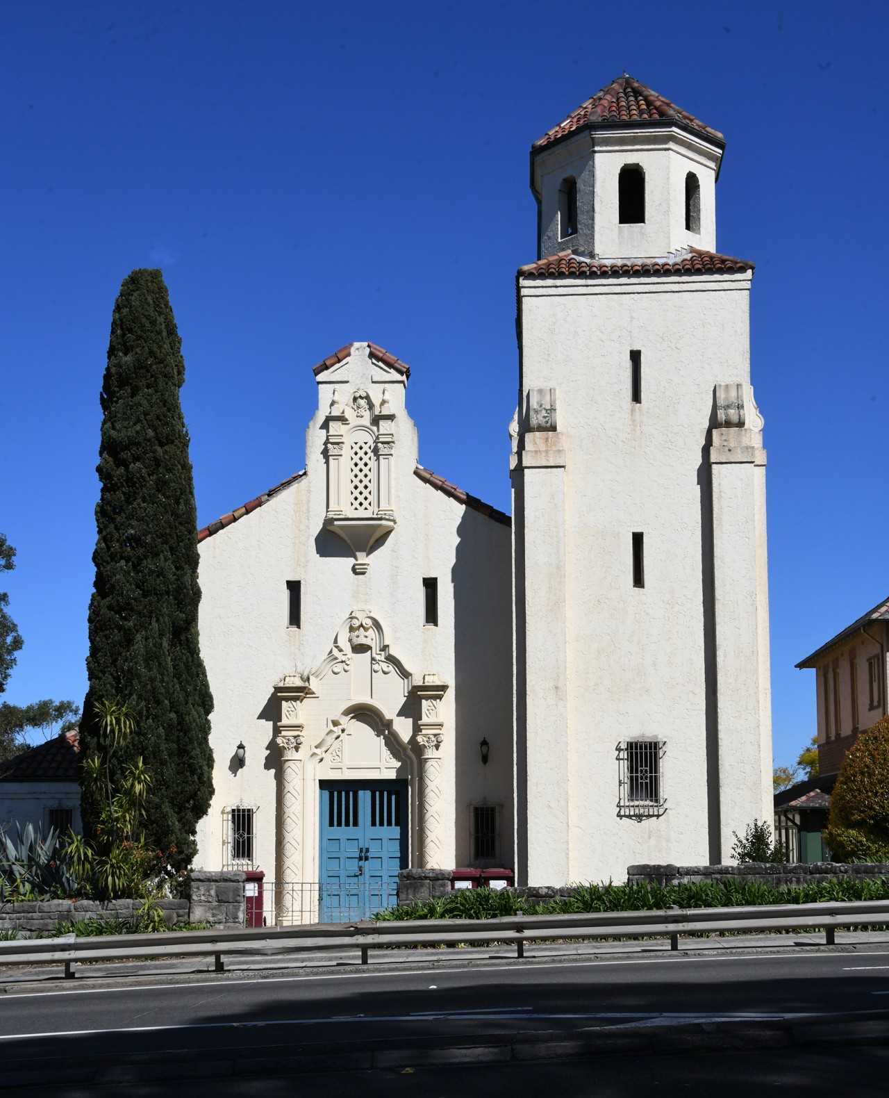Pymble, NSW, Sacred Heart Catholic Church with tower and tree