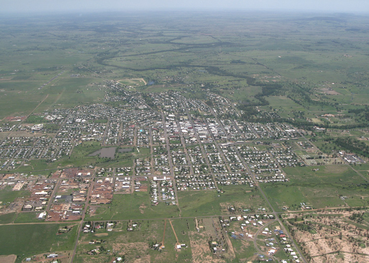 Roma, QLD, Aerial view of town layout and surrounding fields
