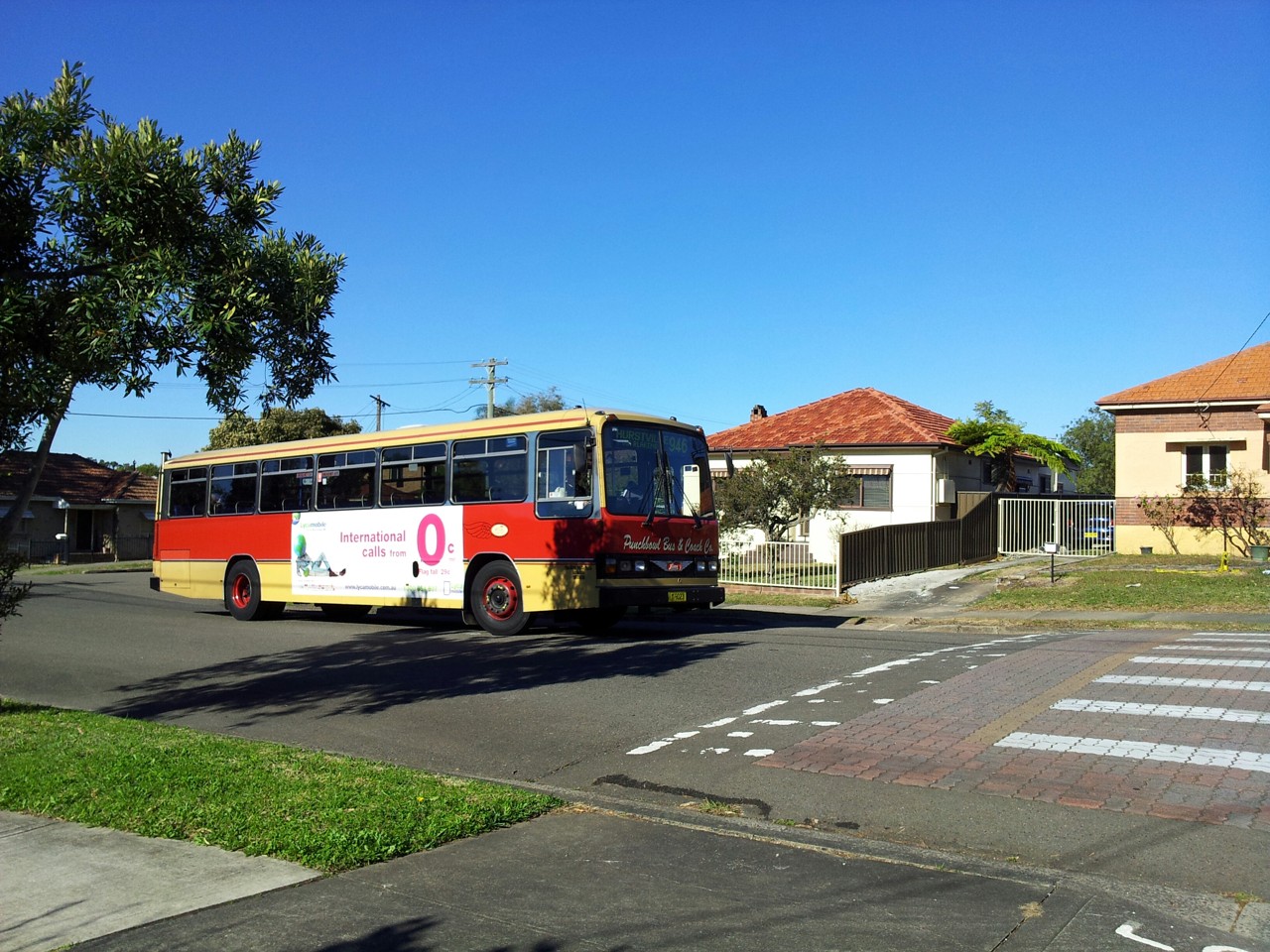 Roselands, NSW, Public bus on a suburban street corner